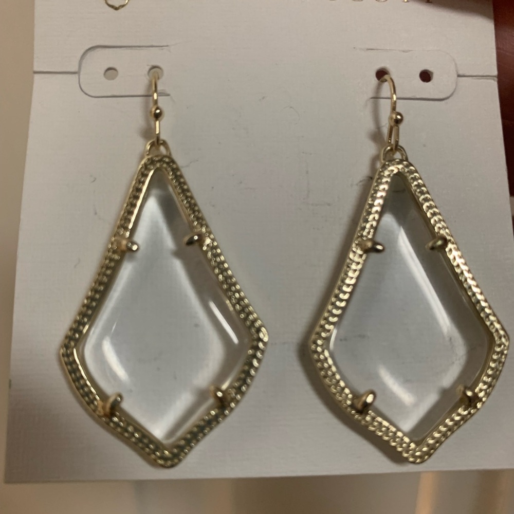 Kendra Scott gold earrings with clear stone